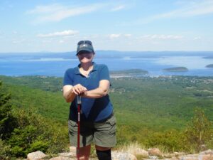 Annmarie atop Cadillac