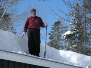 One winter Kelli sent this picture of Ollie shoveling snow off cottage#5 ("our cottage")